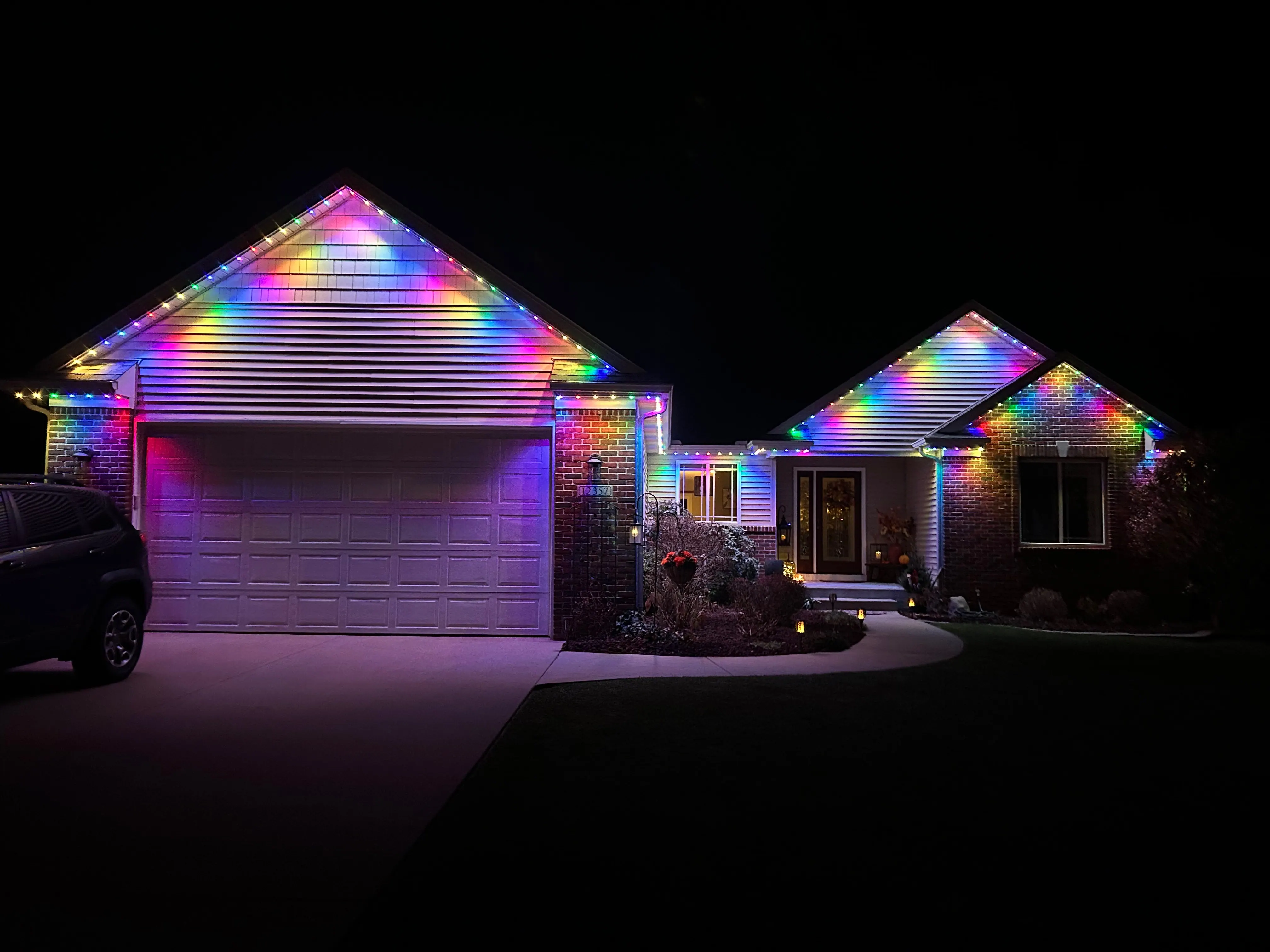 WiFi controllable permanent outdoor lighting on a Charleston area home with app controlled color scenes